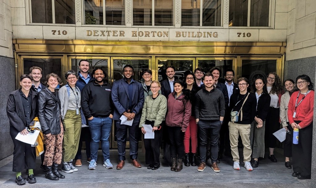 DPD's 21 Rule 9 interns gather outside the Dexter Horton Building in downtown Seattle
